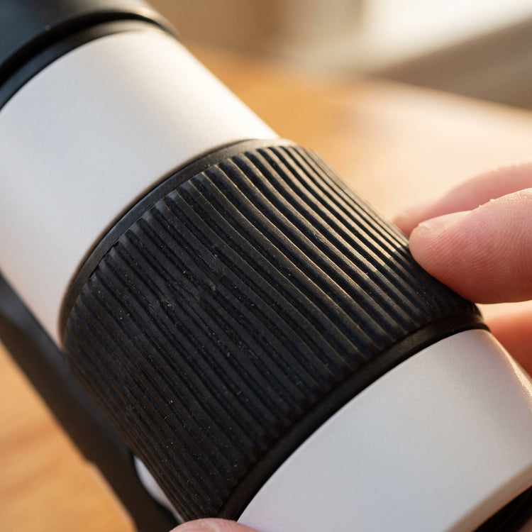 Close-up of the Curio Pocket Microscope twist-to-focus ring